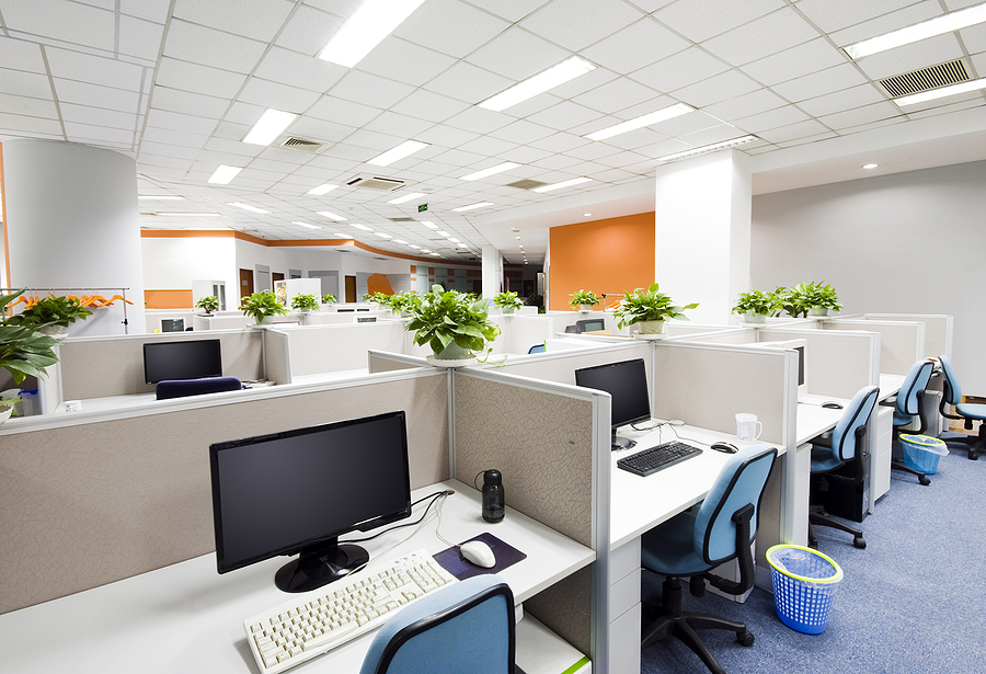 A well-organized office workspace with a computer, stationery, and ergonomic office furniture, setting the scene for productivity.